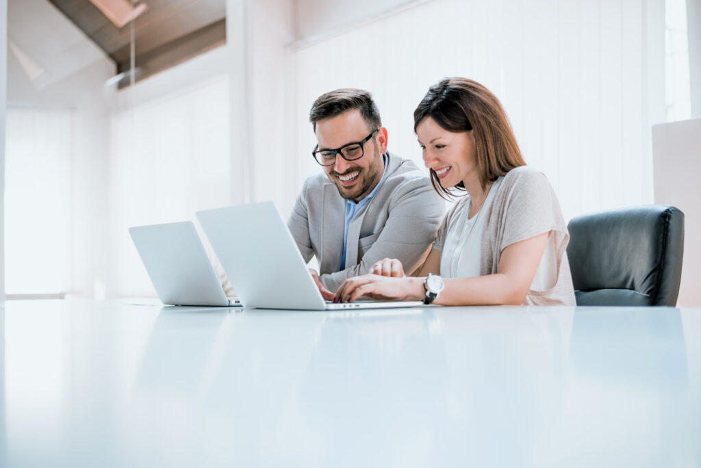 young professionals checking a Sales Acceleration Platform