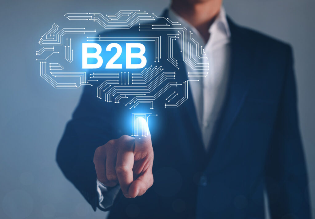 businessman-pointing b2b digital screen