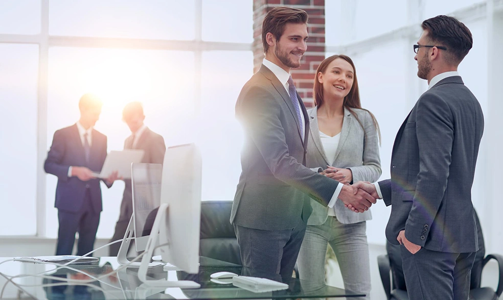 handshake-business-partners-meeting handshake-business-partners-meeting