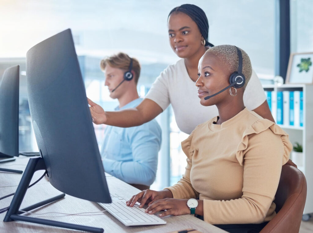 call-center-manager-coaching-sales-consultant-telemarketing-employee-crm-customer-service-worker-with-computer-software-office-agency-mentor-training-woman-with-pc-tech-solution-strategy Sales Coaching practice
